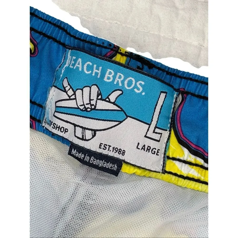 NWT Beach Bros. Scribble Sharks swim trunks in blue and yellow - L